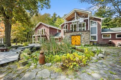 From magical gardens, ponds and trails to the perfect place to take a hammock nap, this whimsical property will impress any nature lover. | Image 2