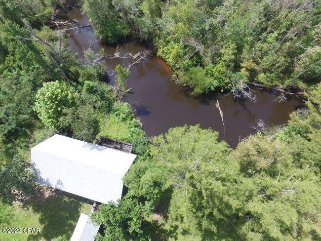 10012 Sw Windsong Way, Home with 3 bedrooms, 3 bathrooms and null parking in Blountstown FL | Image 79