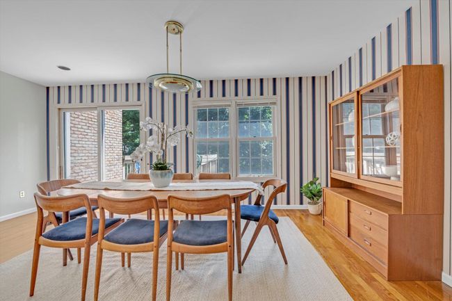 Dining room featuring light wood-style floors | Image 4