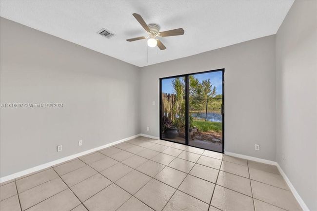 0 - 9780 W Daffodil Ln, Home with 3 bedrooms, 2 bathrooms and null parking in Miramar FL | Image 6