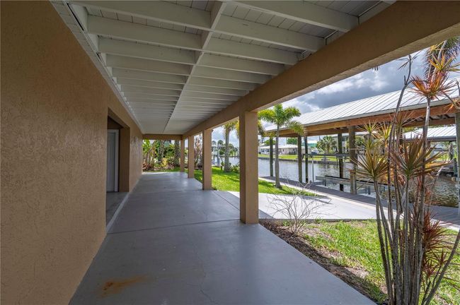 24261 Captain Kidd Blvd, House other with 3 bedrooms, 3 bathrooms and null parking in PUNTA GORDA FL | Image 39