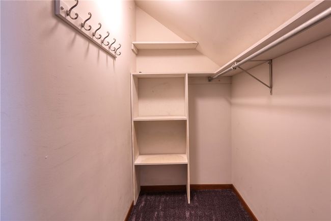 In addition to the primary bedroom, two other bedrooms have walk-in closets. | Image 17