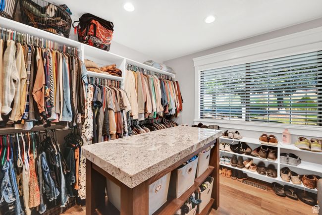 Spacious closet with hardwood / wood-style floors | Image 24