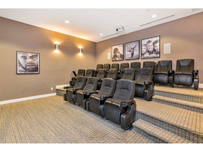 Cinema room featuring carpet flooring, baseboards, visible vents, and recessed lighting | Image 27