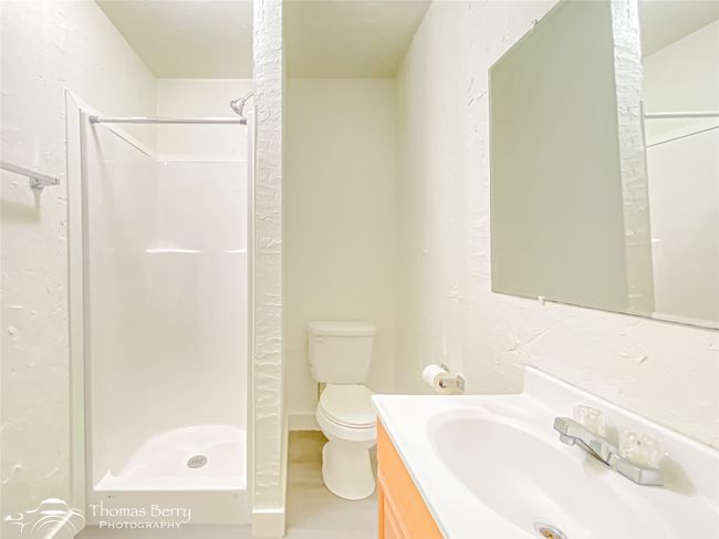 Full bath featuring vanity and a shower stall | Image 22