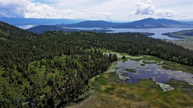 Aerial view with a water and mountain view | Image 9