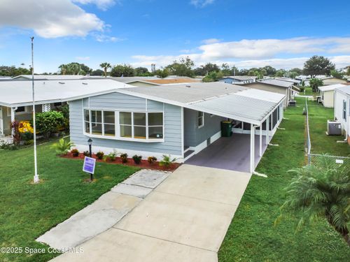 911 Hyacinth Cir, Barefoot Bay, FL, 32976-7668 | Card Image