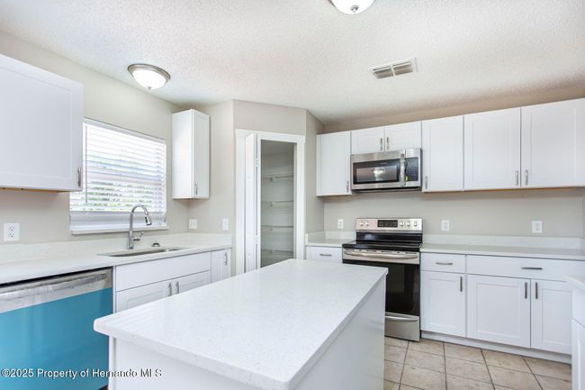 10386 Norvell Rd, House other with 3 bedrooms, 2 bathrooms and null parking in Spring Hill FL | Image 19