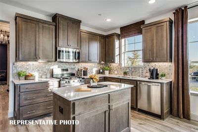 Gorgeous dream kitchens are plentiful in our new homes at Harvest! REPRESENTATIVE PHOTO OF MODEL HOME. | Image 3