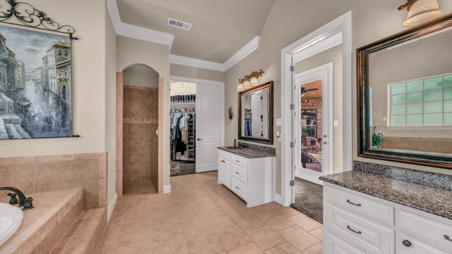 Full bathroom featuring visible vents, ornamental molding, tile patterned floors, and vanity | Image 26