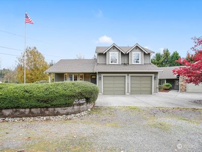 Nestled on a peaceful cul-de-sac, this bright and spacious home offers privacy and room for all your needs. | Image 1