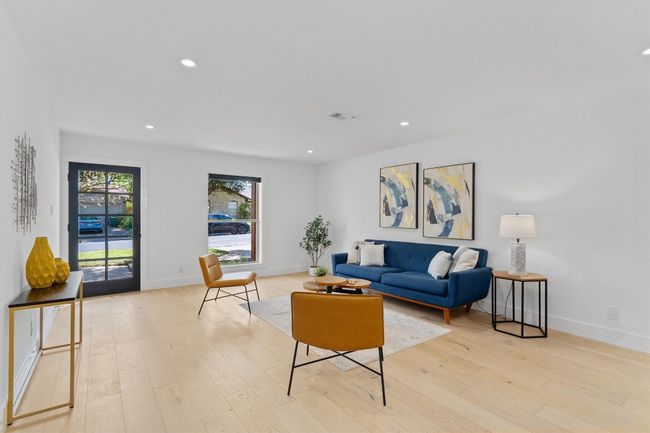 The living room is elegant yet comfortable. | Image 7