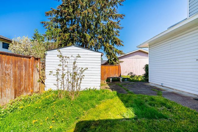 View of shed with fence | Image 25