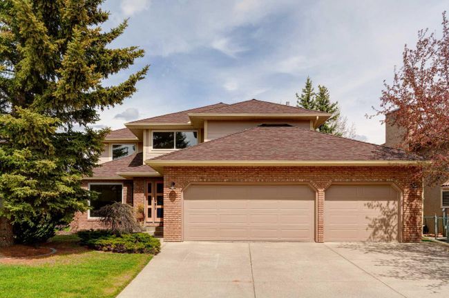 1508 Evergreen Hill Sw, Home with 5 bedrooms, 3 bathrooms and 6 parking in Calgary AB | Image 1