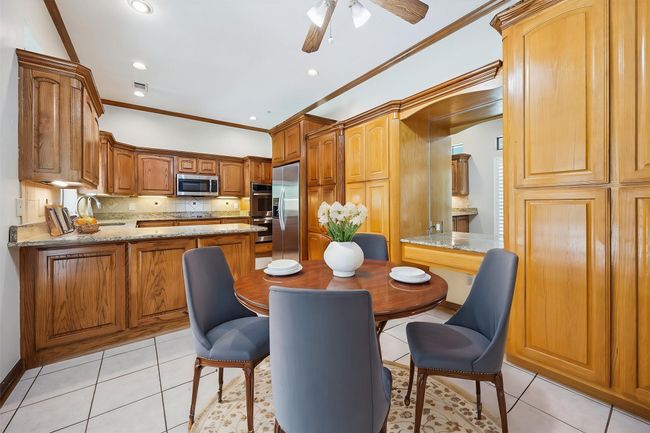 Virtually staged breakfast room. | Image 18
