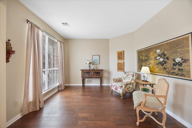 Gorgeous living area can double for home office | Image 13