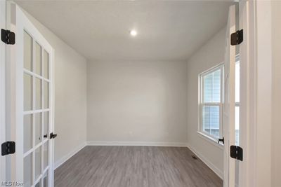 Office with French Doors and picture window | Image 3