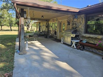 View of patio / terrace with grilling area | Image 1