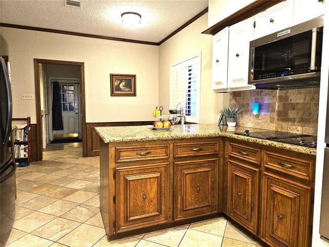 view of kitchen and breakfast room | Image 12