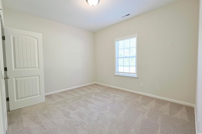 Spare room featuring carpet and baseboards | Image 20