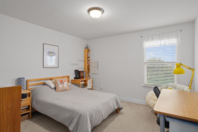 Bedroom featuring carpet and baseboards | Image 22