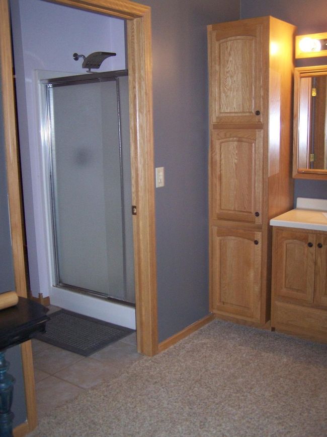 Main bedroom vanity toward bath | Image 6