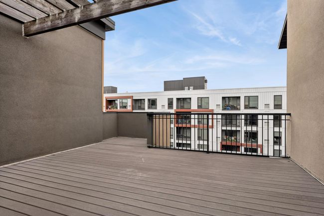 This stunning rooftop deck is the showstopper—your private sky lounge with panoramic views of the city. | Image 35