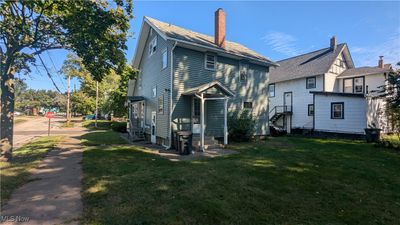 Back of house featuring a lawn | Image 2