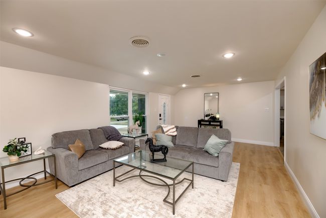 Living room featuring light wood-style floors, recessed lighting, and baseboards | Image 6