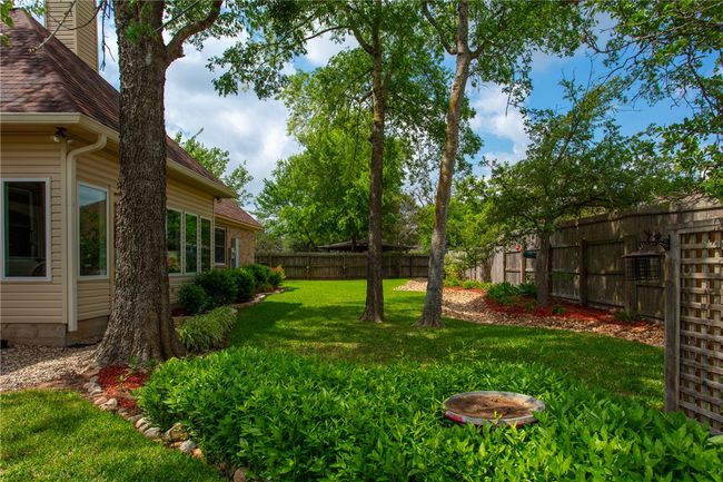 View of yard featuring a fenced backyard | Image 34