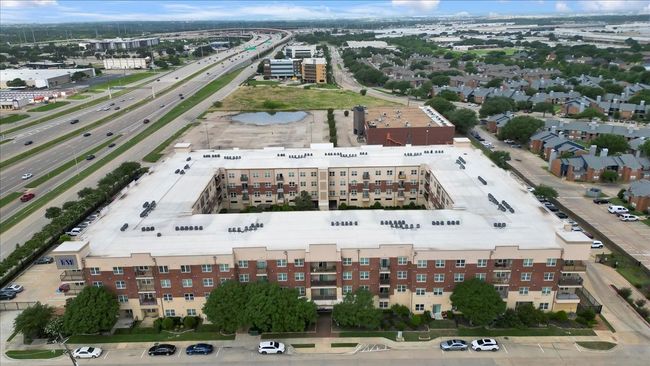 View of property location featuring a highway and apartment complex | Image 28