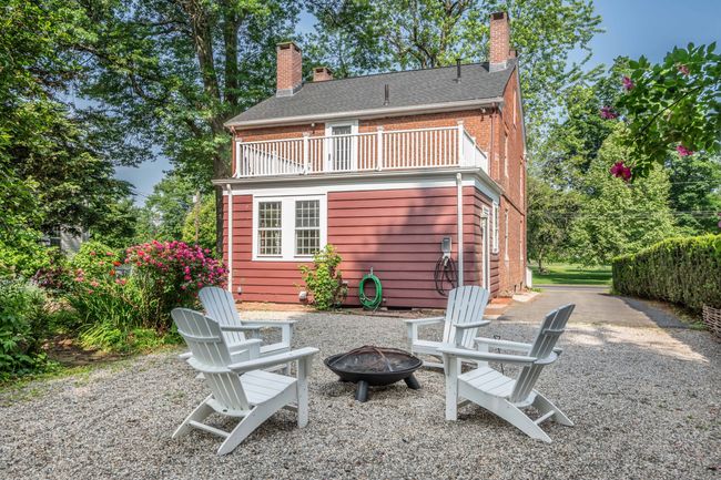A view of the rear of the house. Can you spy the EV outlet? All of the modern day conveniences. | Image 5