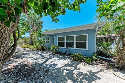 Tropical Garden Path leading to you Front Door | Image 1