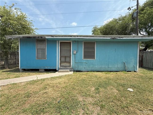 Ranch-style home with fence and a front yard | Image 26