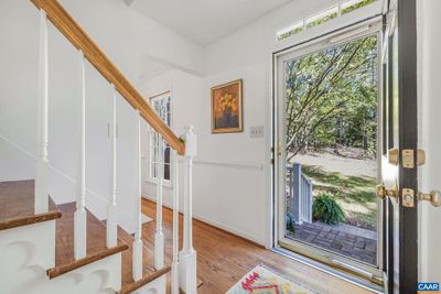 Inviting foyer with coat closet | Image 3