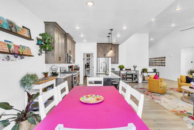 Dining space with light wood-style flooring and recessed lighting | Image 13