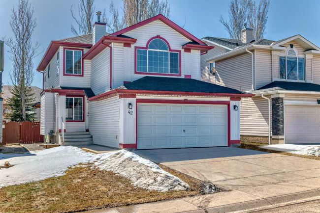 42 Bridlecreek Park Sw, Home with 5 bedrooms, 3 bathrooms and 4 parking in Calgary AB | Image 1