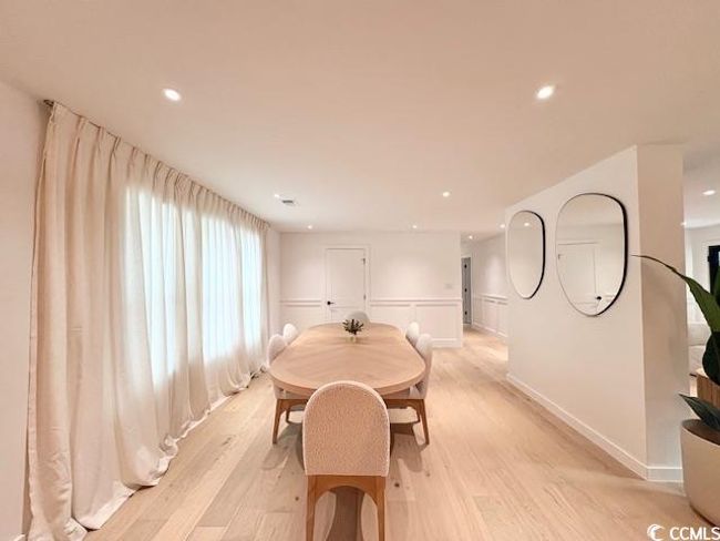 Dining area with recessed lighting and light wood-style floors | Image 14