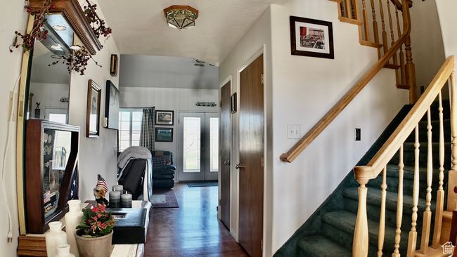 Interior space featuring wood finished floors | Image 58