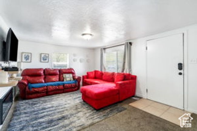 View of carpeted living area | Image 9