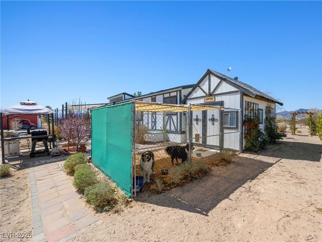 Air conditioned puppy den with covered dog run. | Image 57