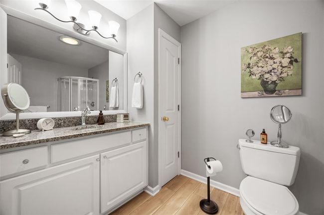 His and her closets flank both sides of the hallway that lead to the master bathroom. | Image 24