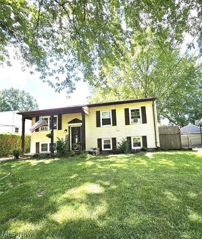 Split foyer home featuring a front lawn | Image 2