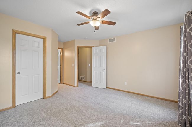 Primary bedroom with new carpet | Image 22