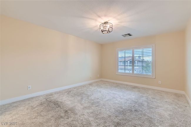 Carpeted empty room with baseboards | Image 25