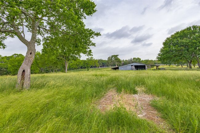View of yard featuring an outdoor structure | Image 39