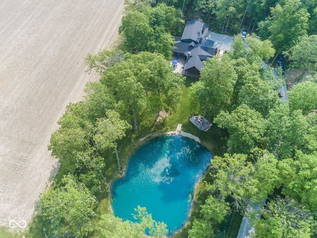 view from above of property featuring a nearby body of water | Image 60