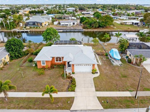 125 Baldwin Ct Se, PORT CHARLOTTE, FL, 33952-9702 | Card Image
