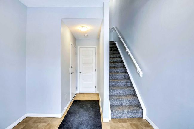 201 - 70 Saddlestone Dr Ne, Townhouse with 2 bedrooms, 3 bathrooms and 1 parking in Calgary AB | Image 4