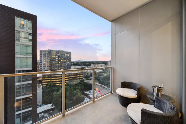Balcony with a view of city | Image 19